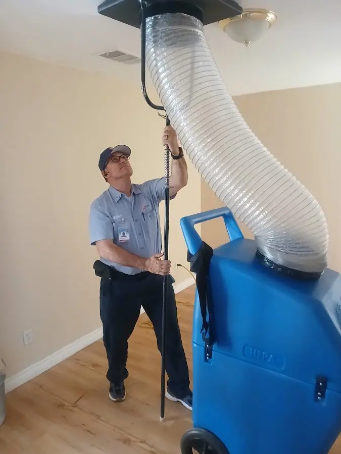 HVAC Installation technician using HEPA equipment in Beach Park